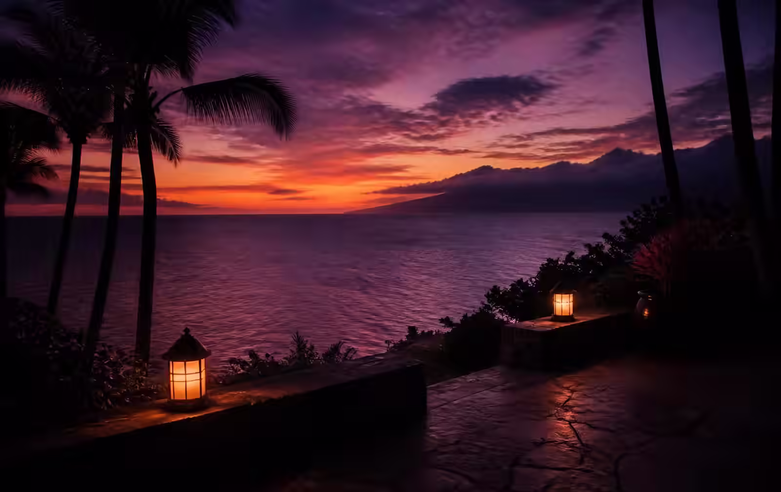 Warm sunset light over the ocean seen from a quiet Maui resort terrace