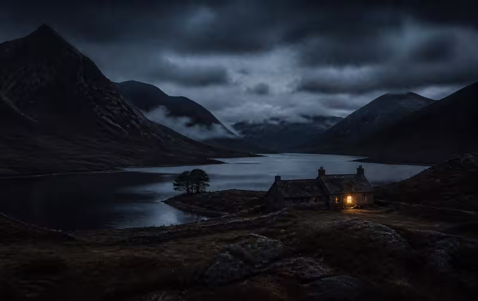 Dark Highland glen at night with mountains, a still loch and a remote stone lodge showing one warm window