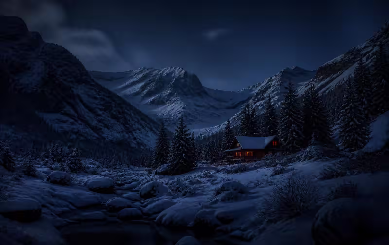 Snow-covered Colorado peaks glowing at dusk above a warmly lit alpine town