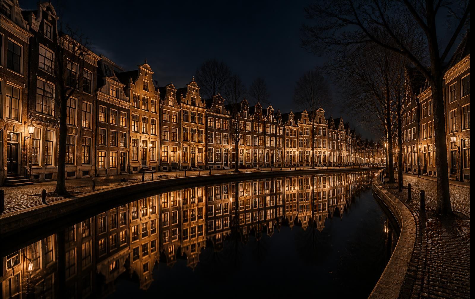 Curved Amsterdam canal at night with gabled merchant houses and golden window light reflected in still dark water