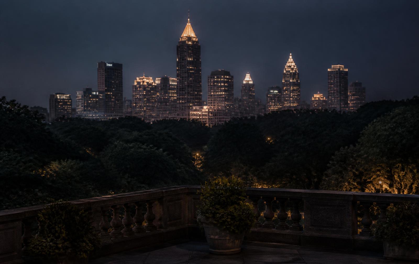 Dim high-rise hotel room in Atlanta with city lights spread out beyond floor-to-ceiling glass