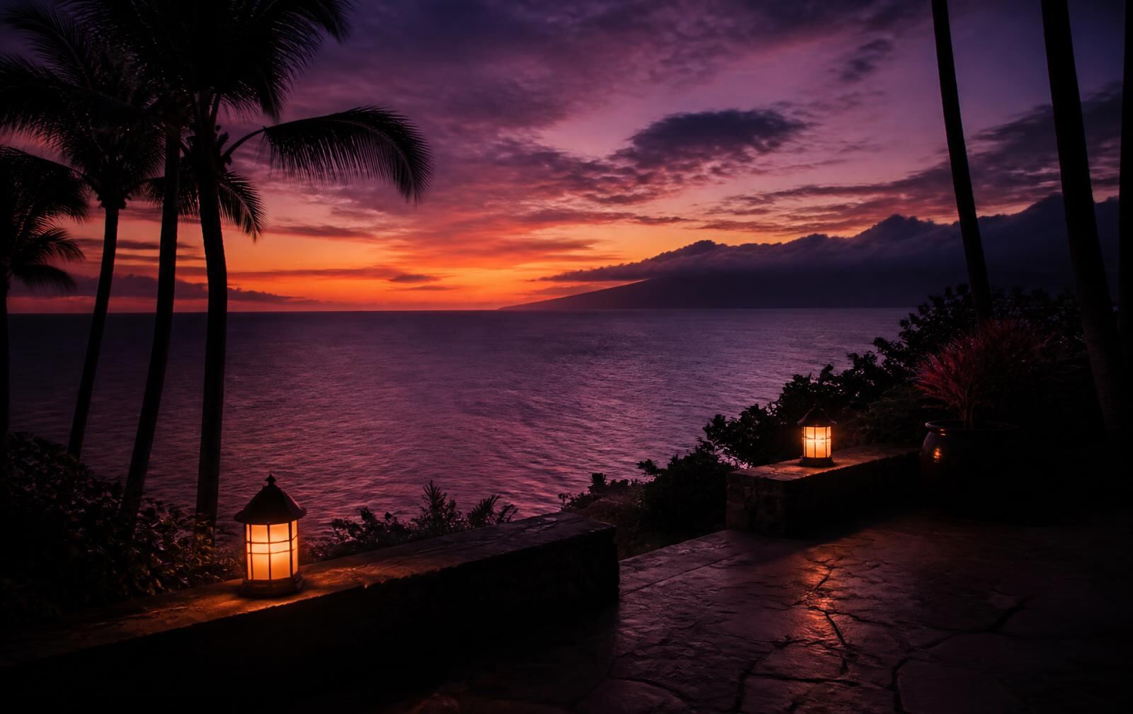 Warm sunset light over the ocean seen from a quiet Maui resort terrace