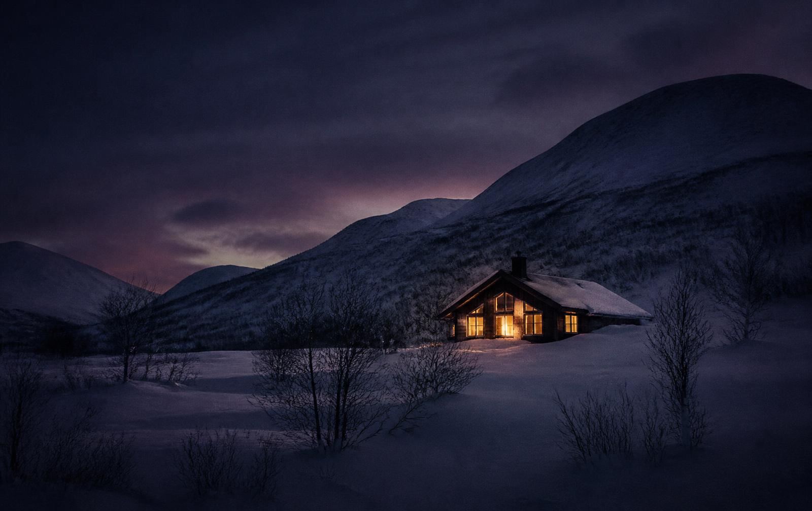 An Arctic Swedish winter landscape in polar twilight, deep snow and dark hills with a single timber lodge showing warm gold windows