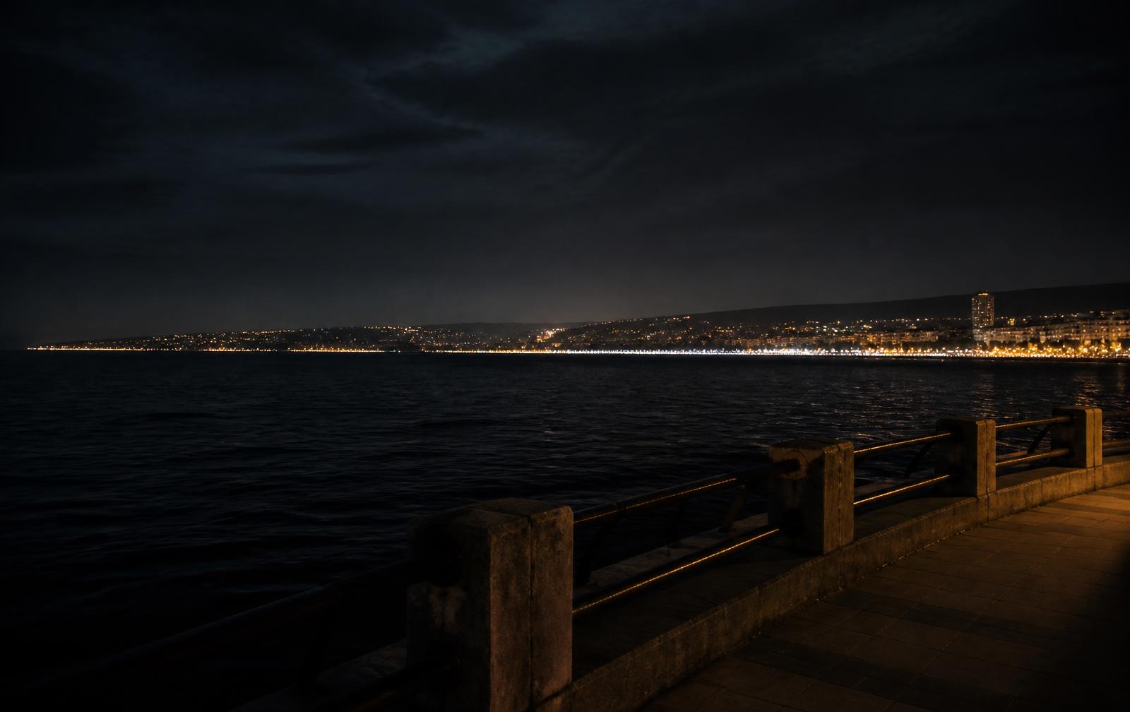 The Varna and Golden Sands coastline at night — resort lights along the dark Black Sea horizon