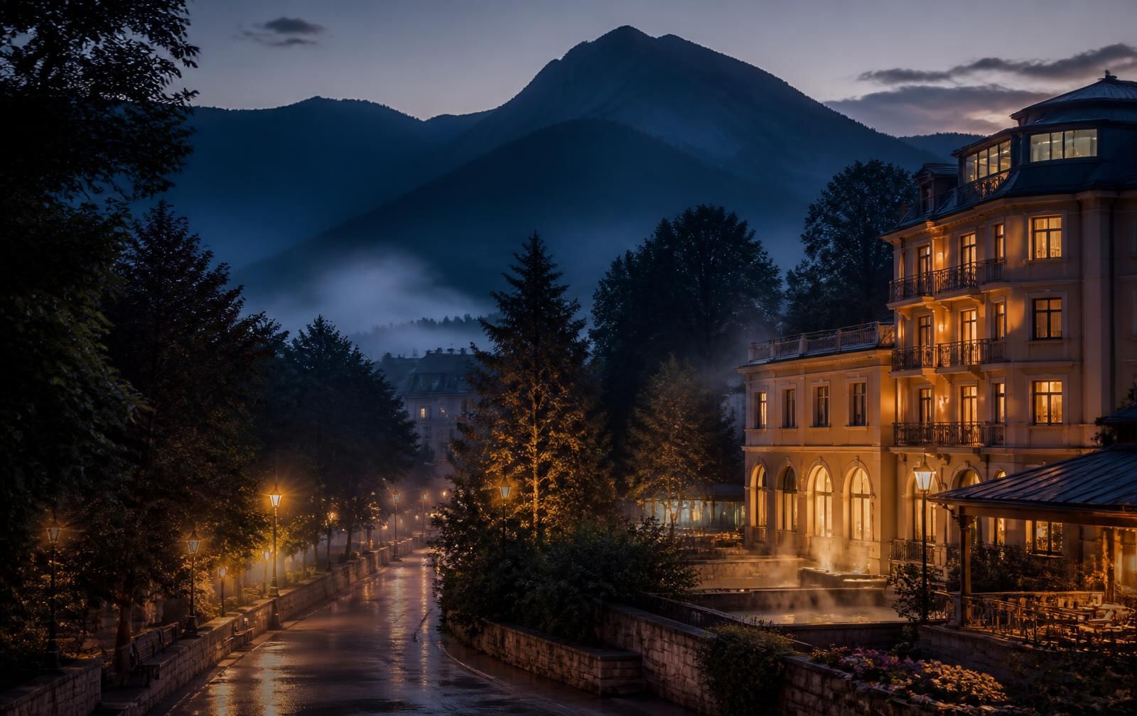 Velingrad at dusk — mist over a quiet tree-lined street with warm spa-hotel windows and mountain silhouettes